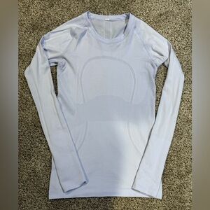 Lululemon top in lavender. Size 6. Great condition.